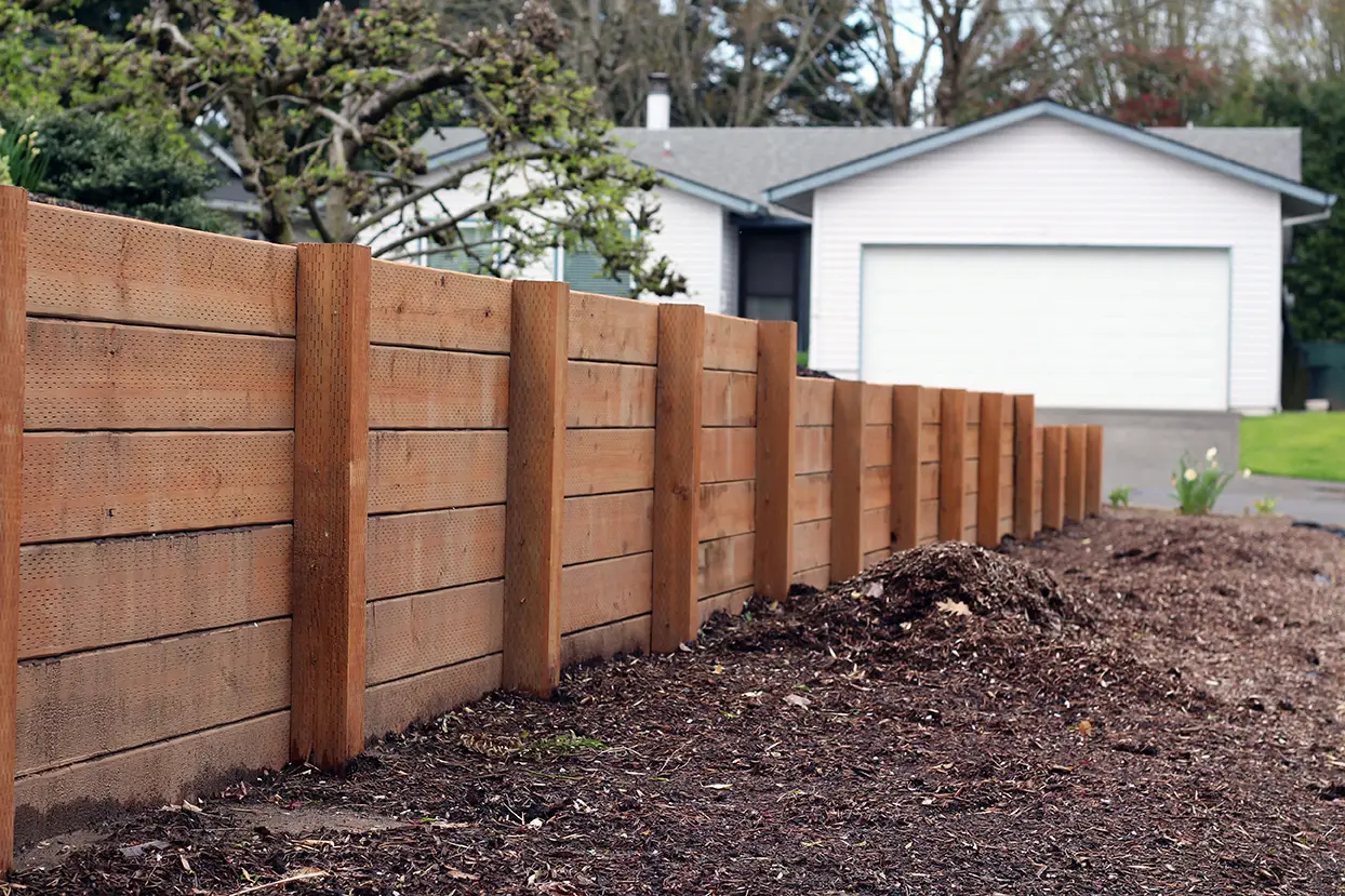 Reinforced concrete retaining wall built for heavy-duty support by Engineering on Demand